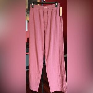Skims boyfriend pants in beet